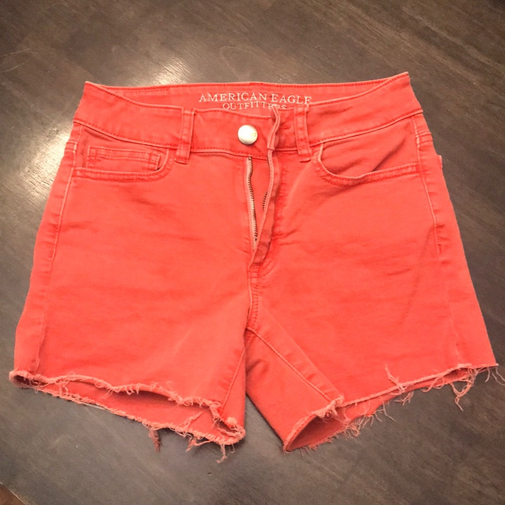 Red faded American Eagle shorts
